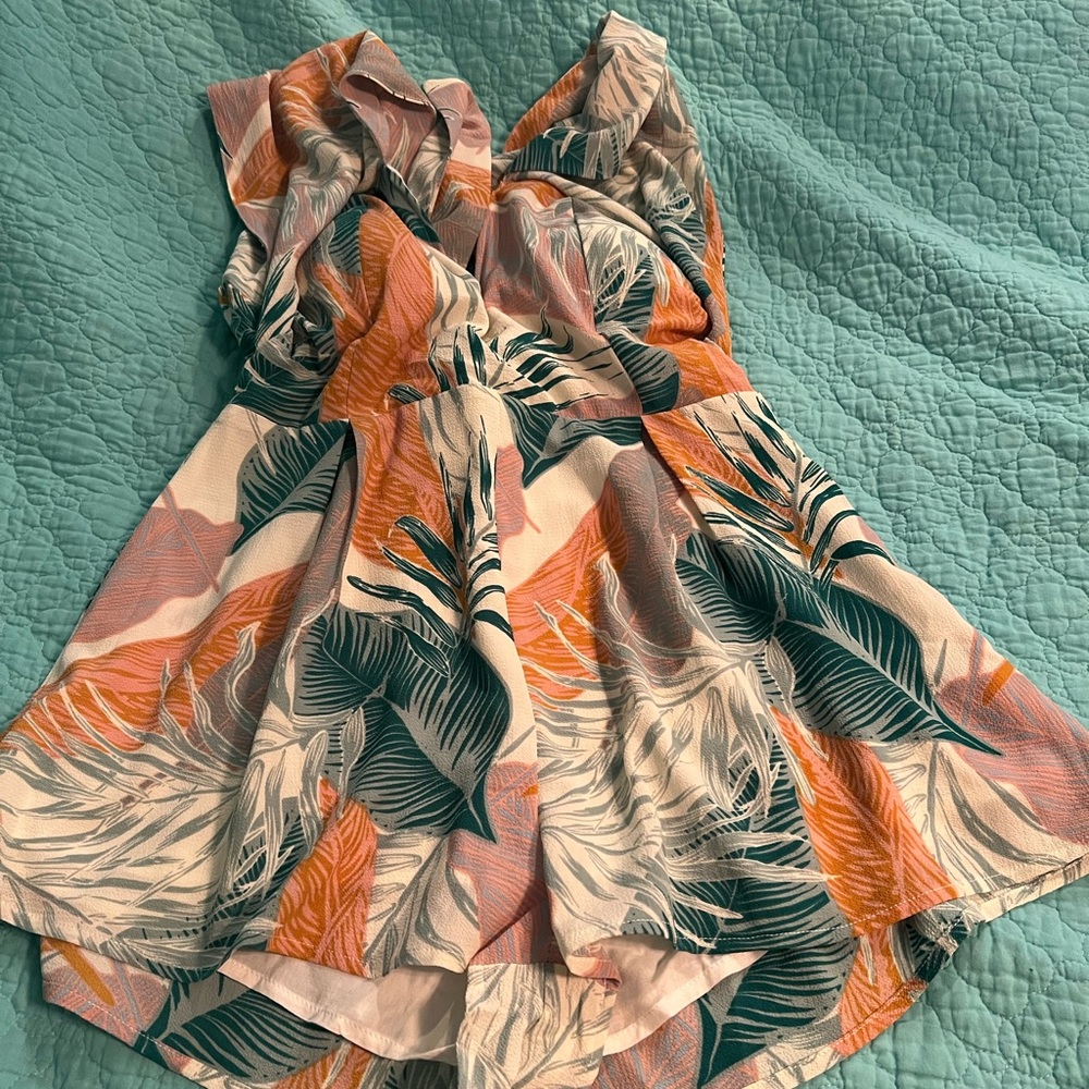 Tropical romper, brand new with tags still attached never worn. Halter top